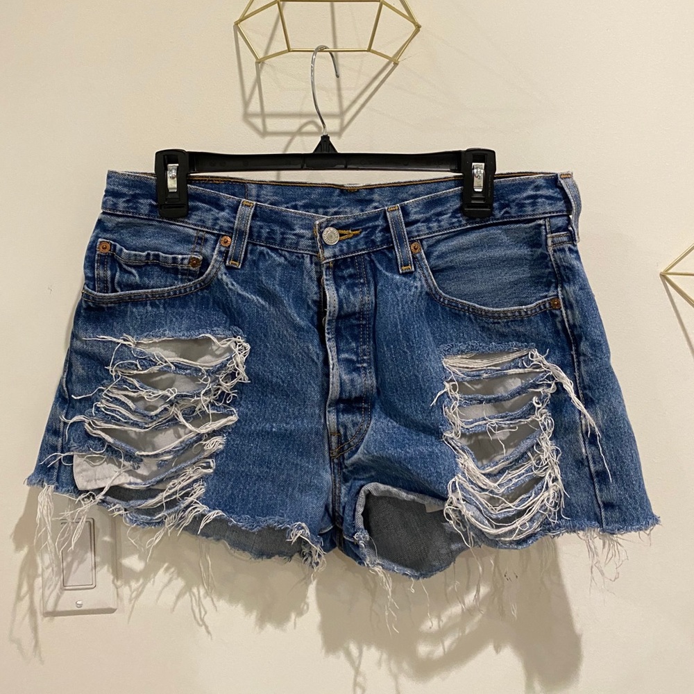 Levi’s ripped light wash jean shorts